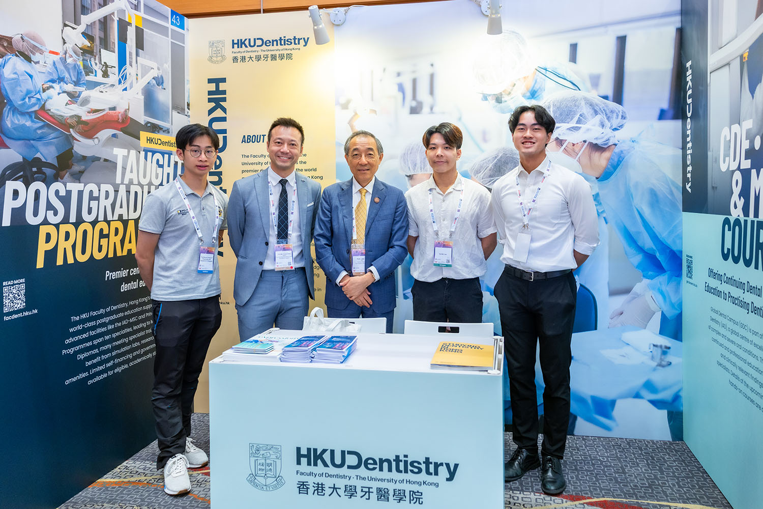 HKU Faculty of Dentistry, HKIDEAS 2025, Professor Jin and Professor Mike Leung with the BDS students at the Faculty booth